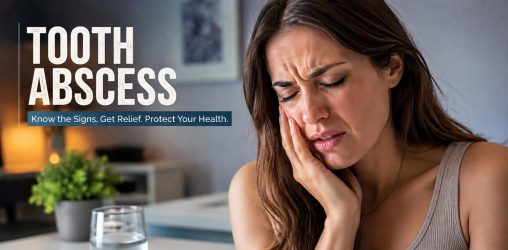 a woman with a tooth abscess holds her jaw in pain